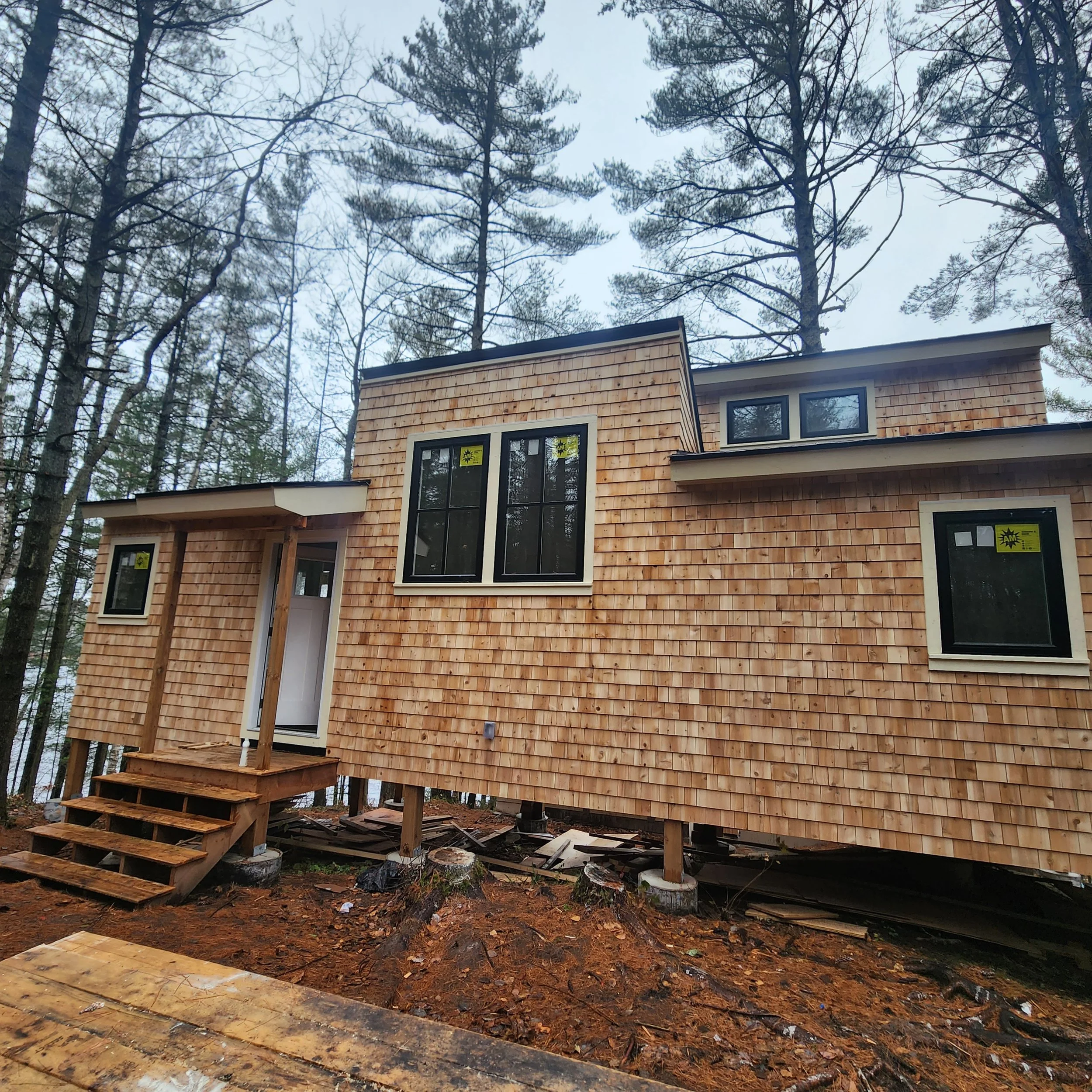 modern-cottage-construction-cedar-exterior-elevated-foundation-baysville-muskoka-ontario.jpg