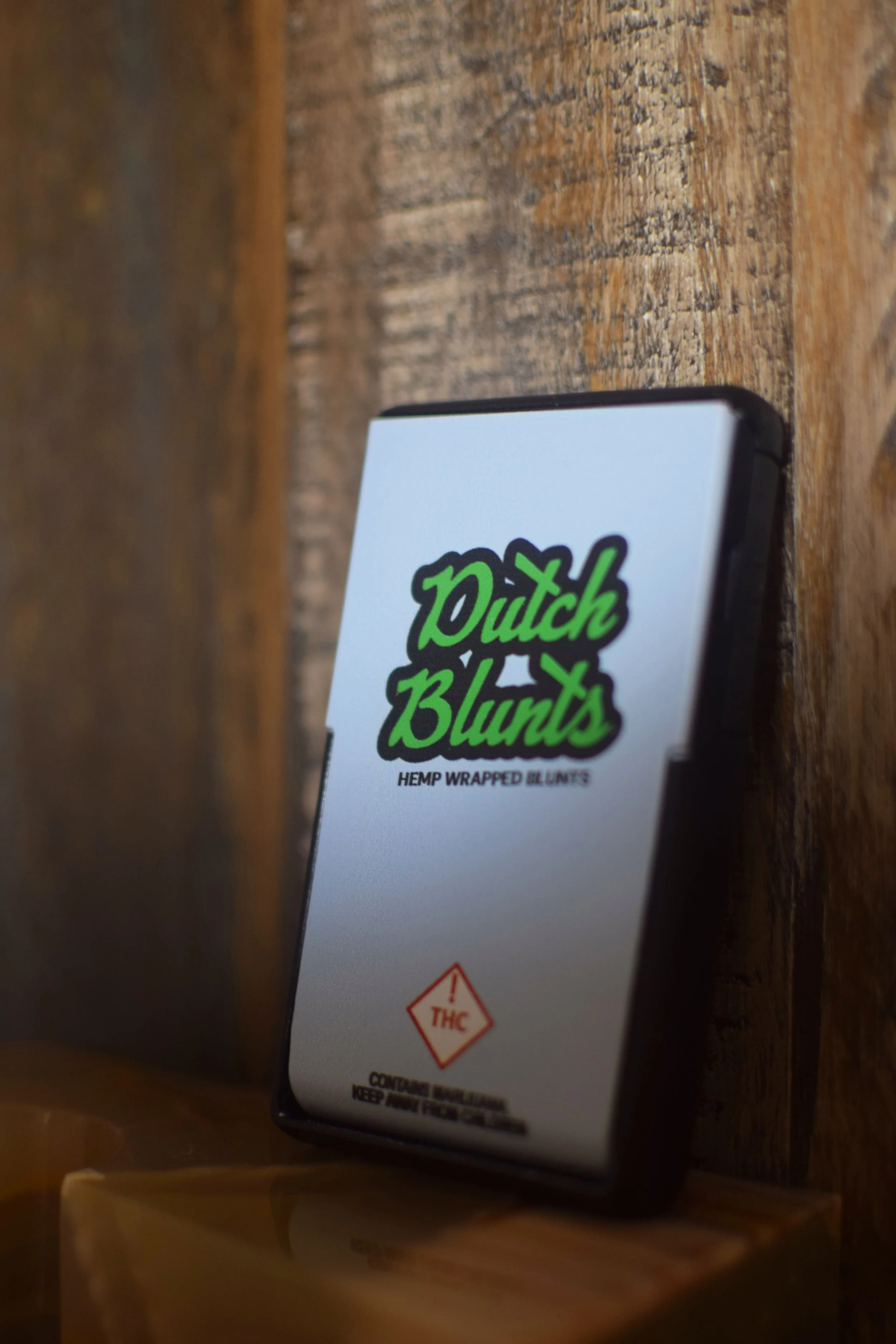 Box of Dutch Blunts hemp wrapped blunts with THC warning label.