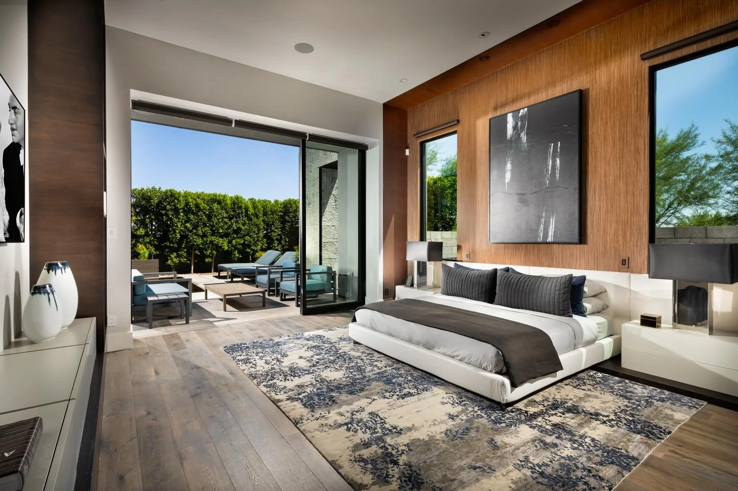 Bold, rich tones paired with an easy connection to the outdoors&mdash;this master suite was made for slow mornings and living that spills outside. ☕️☀️ 

Builder: @sheahomesaz  Tech Integration: @cybergroupscottsdale