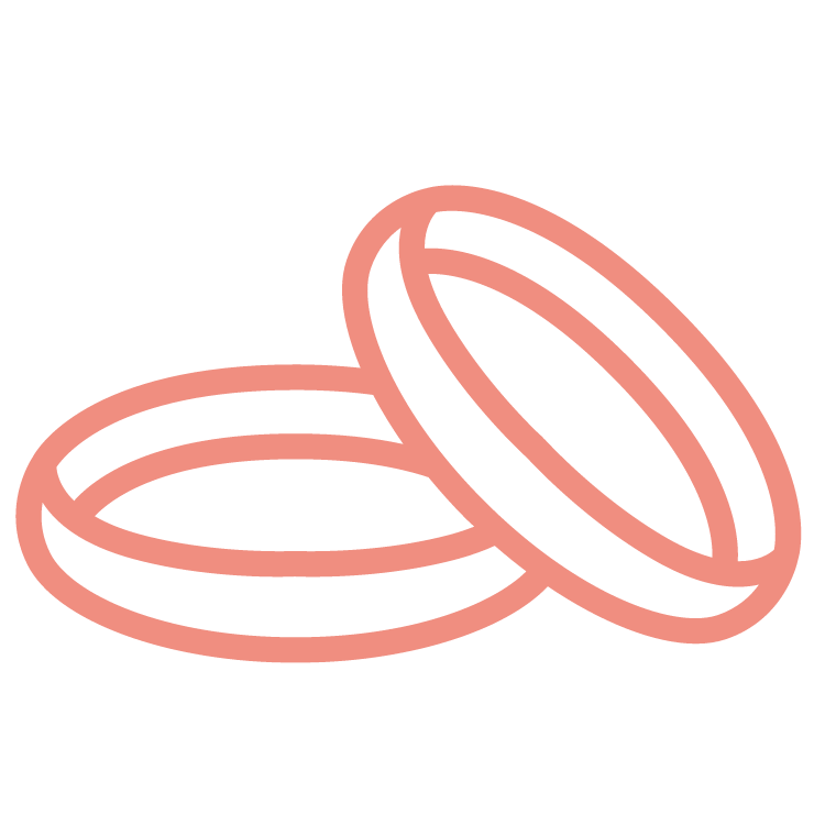 Outline illustration of two coffee beans, one partially opened, in pink and black.
