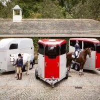 An image of a trailer with a link to this websites trailer tracker shop page.