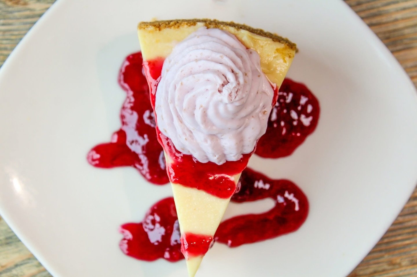 Add a little sweetness to your weekend! 🍰 

Our White Chocolate Cheesecake is a blend of white chocolate ganache, cream cheese, and white chocolate chips on a graham cracker crust. Garnished with raspberry Melba sauce and homemade raspberry mousse. 