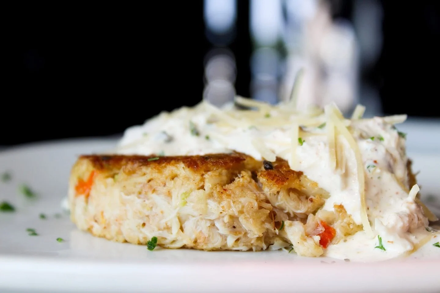 No filler, all flavor. 🦀

Six ounces of hand-crafted crab cake made from blue crab meat blended with saut&eacute;ed vegetables and seasonings. Grilled and topped with blue crab meat ravigotte and Parmesan. 

📱 Find your nearest Half Shell, join the
