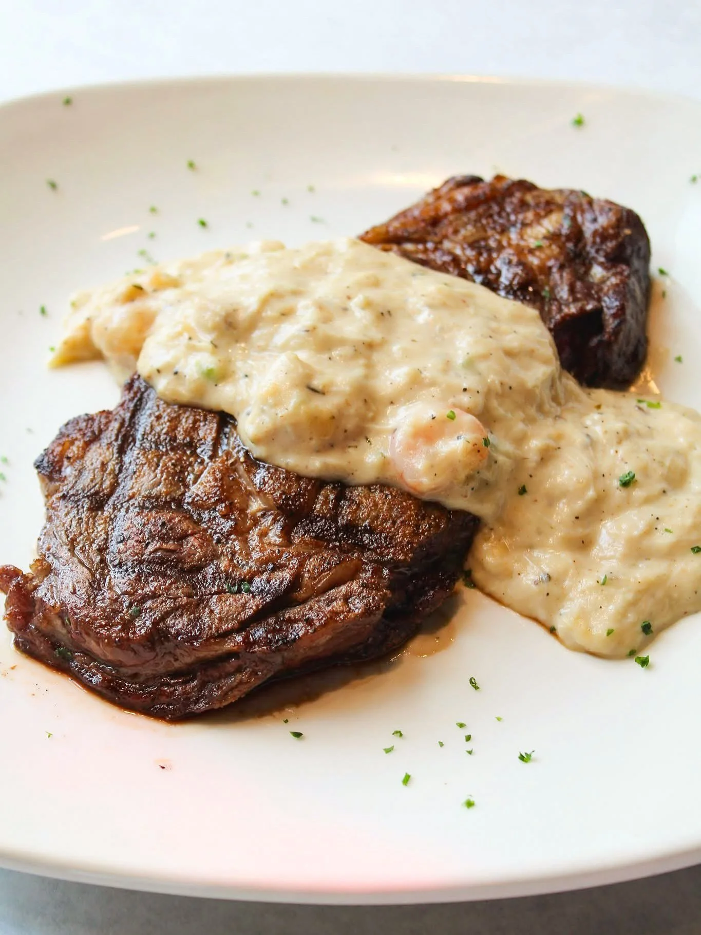 Surf, turf, and a swirl of red. Our Ribeye Au Gratin is calling... all you need to do is pick your favorite bottle to pair. 🍷 

Join the waitlist, view our menu, order online, and more at halfshelloysterhouse.com.
