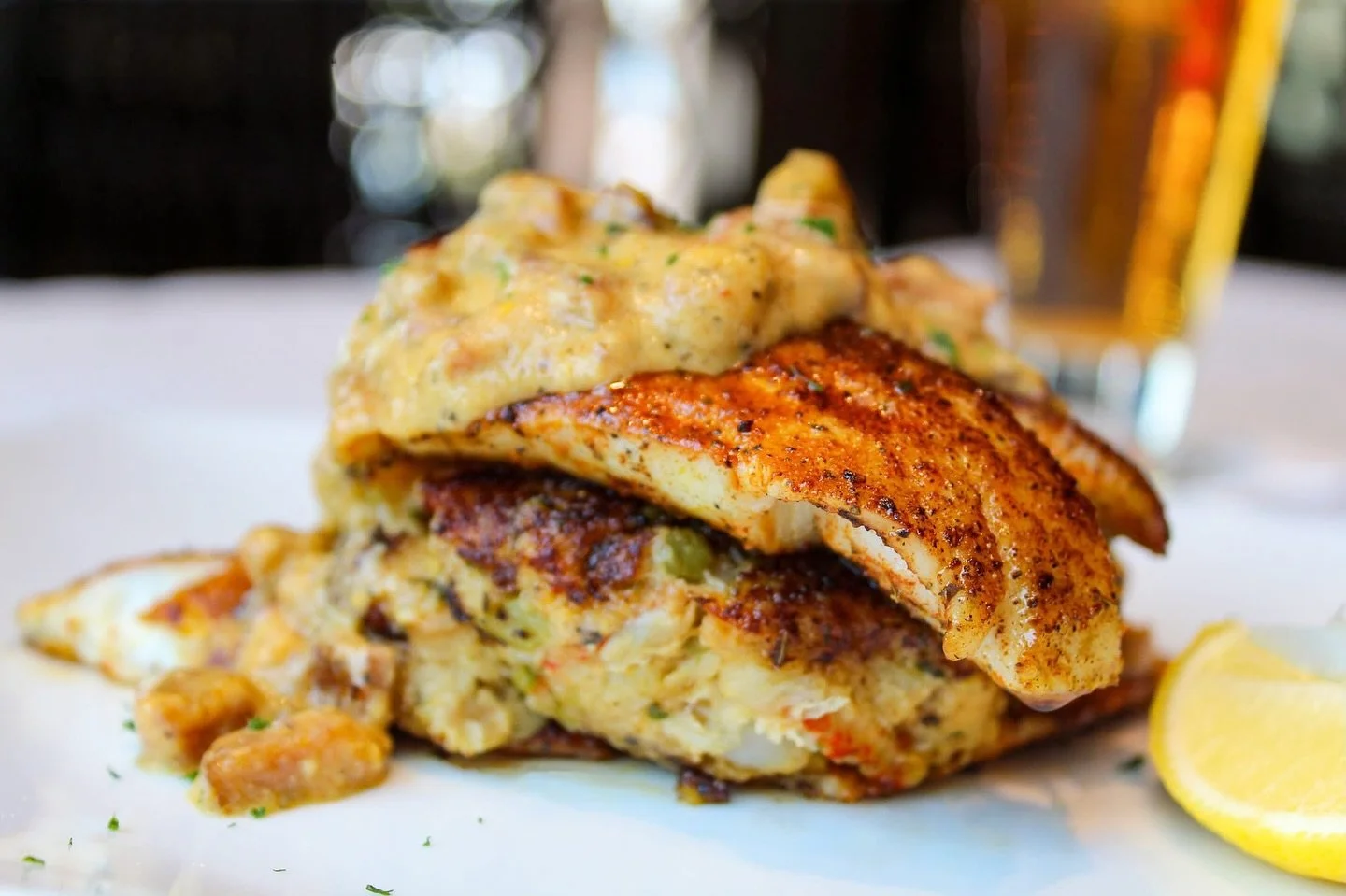 Fall calls for comfort food with a little Cajun flair! ⚜️

Say hello to our NEW Bayou Blackened Trout &mdash; blackened trout served with a homemade seafood cornbread dressing made of blue crab meant, Gulf shrimp, and crawfish. Covered with a Tasso h