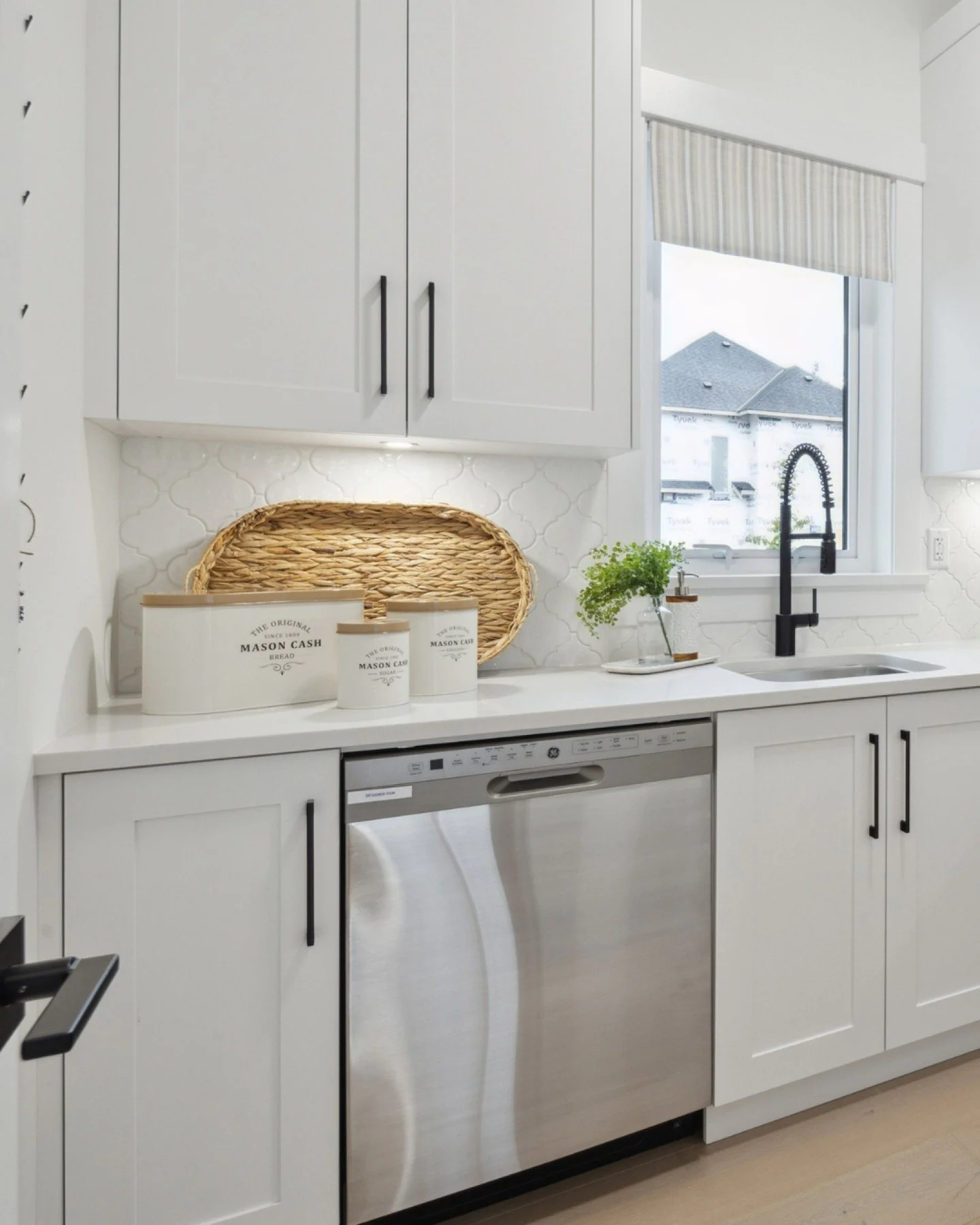 A bright prep kitchen in our French Provincial home in Brookswood, Langley&mdash;timeless cabinetry, soft whites, and thoughtful detailing. 🌿

Let&rsquo;s bring your vision to life.
604-777-5653 | info@firstimpressiondesigns.com
&bull;
&bull;
&bull;