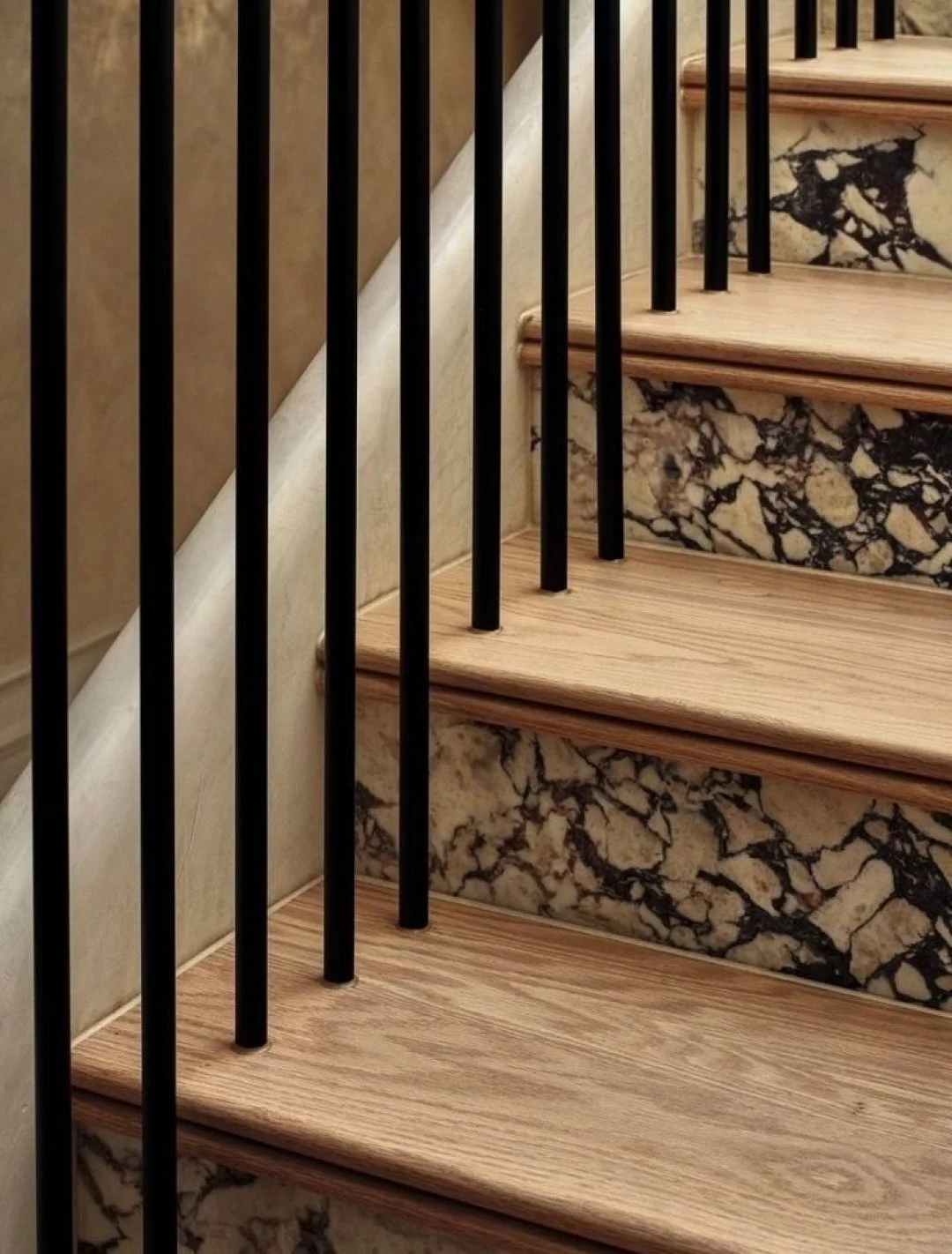 Rich veining, warm oak tones, and striking contrast details that turn everyday architecture into a design statement. 

Let&rsquo;s bring your vision to life.
604-777-5653 | info@firstimpressiondesigns.com

#interiordesign #staircasedesign #luxuryinte