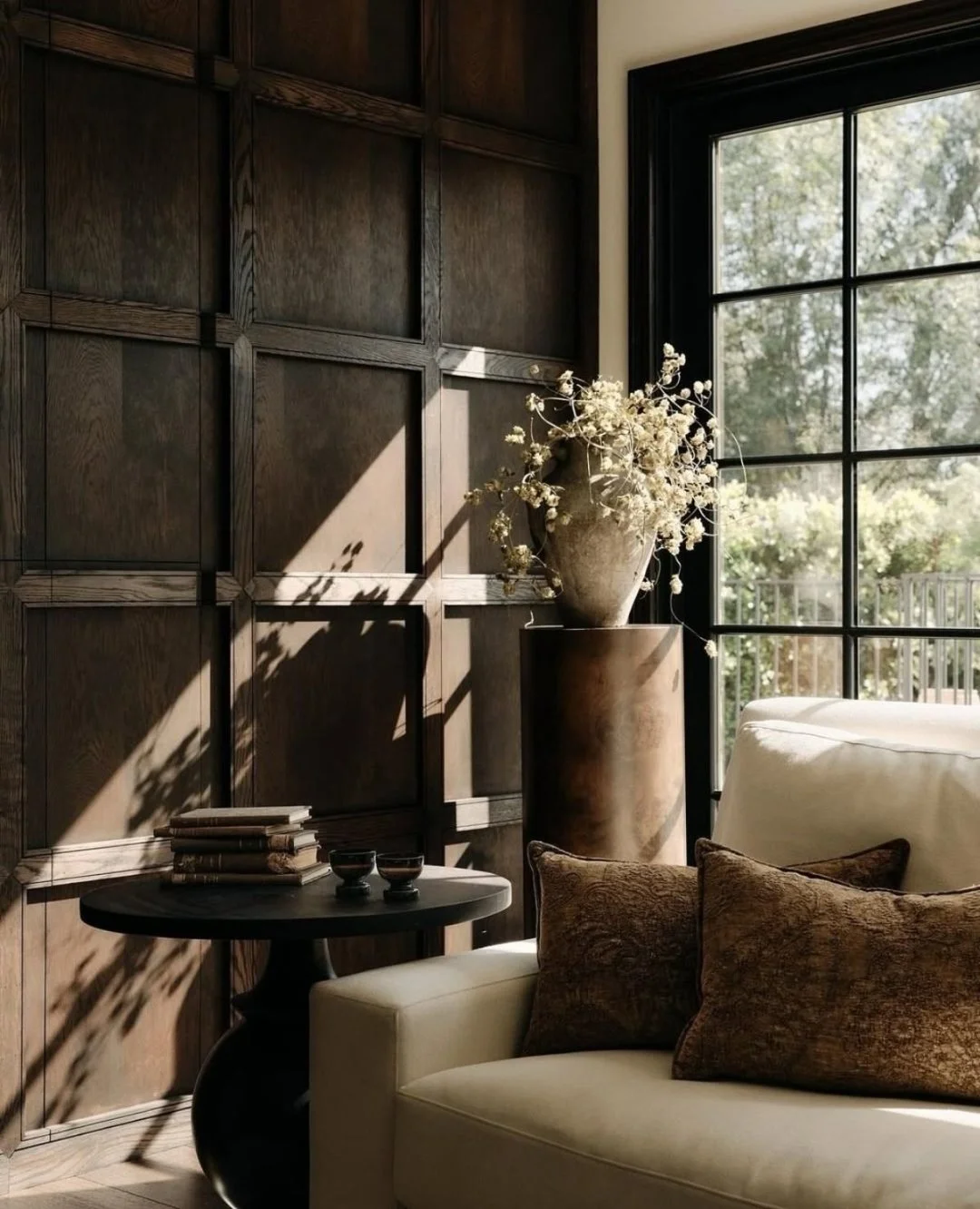 Rich, grounded, and full of depth. We&rsquo;re loving the return to chocolate brown, especially when paired with natural wood and softened by warm, diffused light.

Here, the depth of the wall panelling creates an architectural backdrop, while creamy
