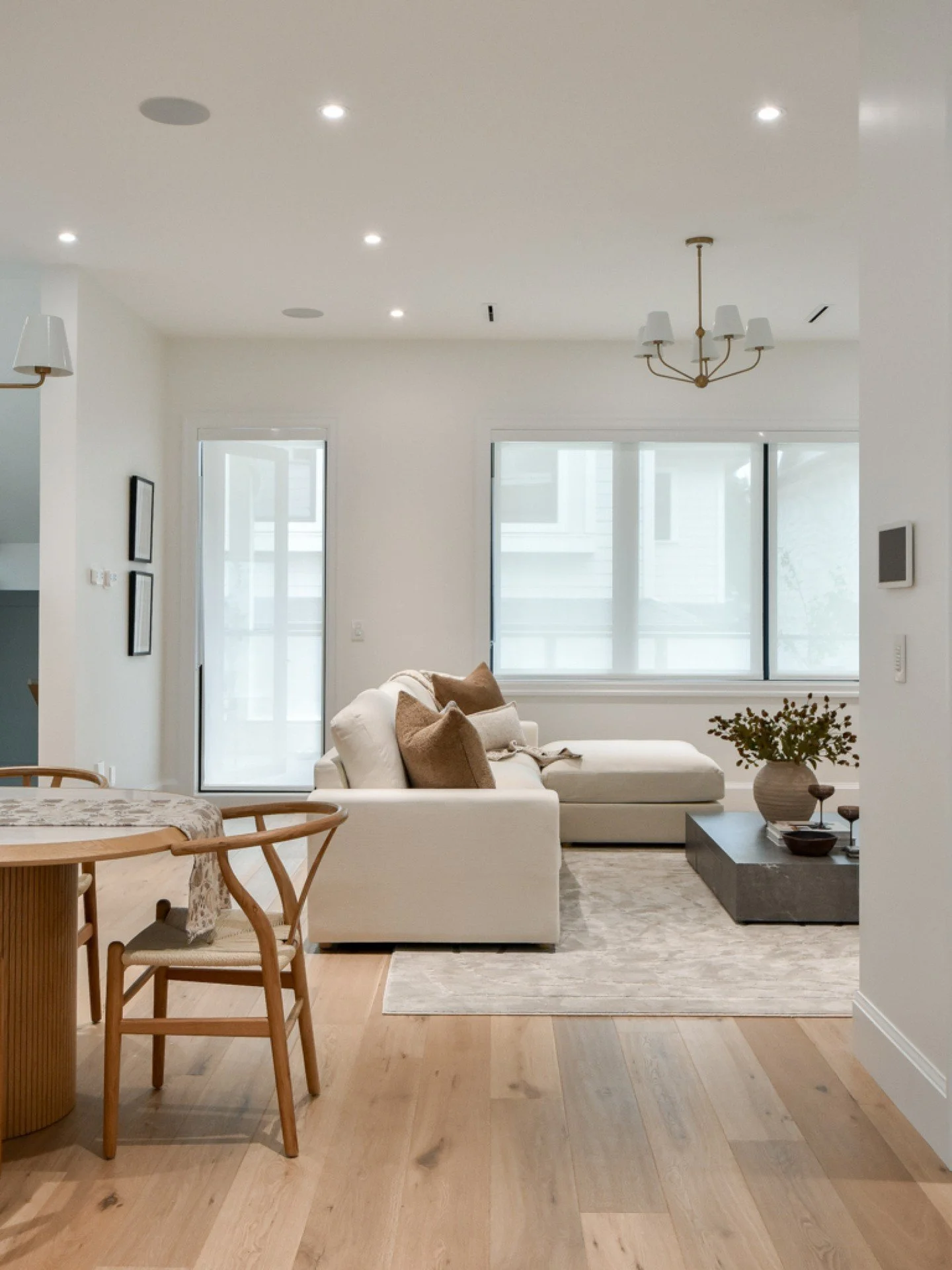 Soft architecture, warm oak and a restrained tonal palette bring an easy sense of refinement to The Ellery. From the sculptural dining details to the layered living space beyond, each element was considered to feel connected, comfortable and quietly 