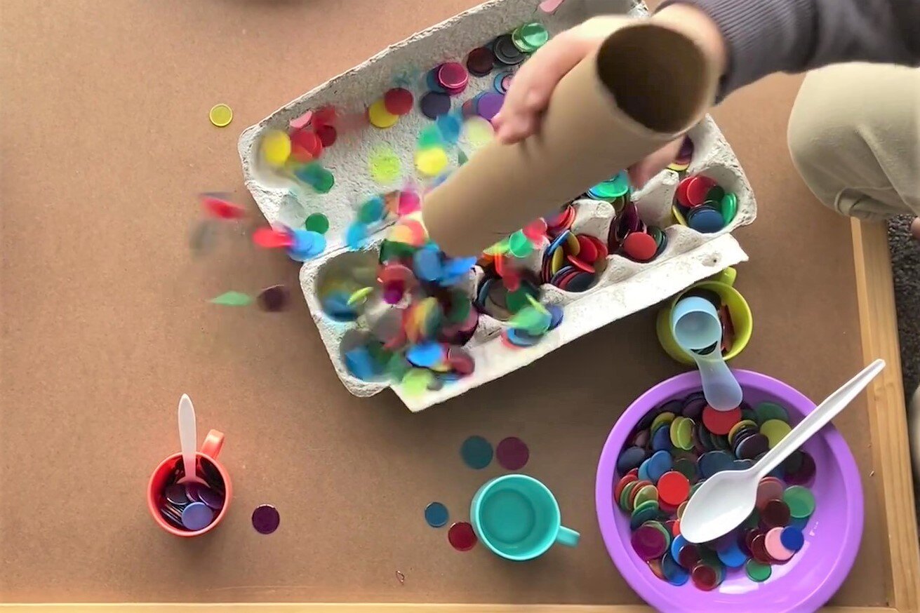 Recycled play - cardboard tube pouring.jpg