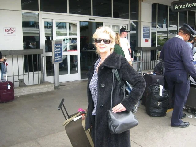 In motion, in transit: a happy place for me. Airports are exciting; the expectation is contagious. By Kitty Wise