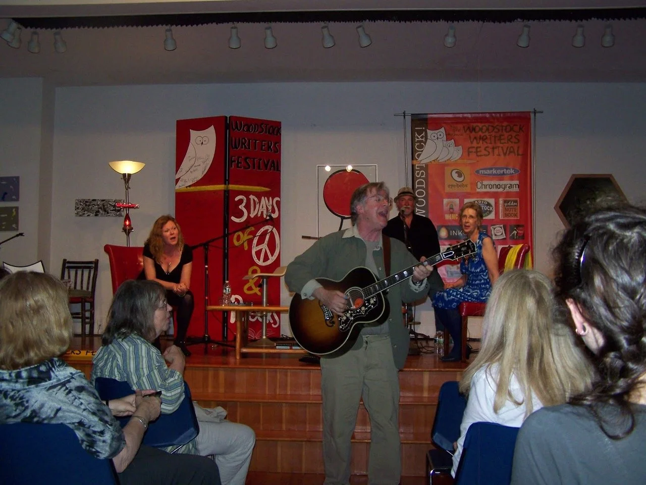 For the Woodstock Writers Festival 2010, I created a songwriting panel at the Kleinert Gallery in Woodstock with John Sebastian, Robbie Dupree, and Jonell Mosser. Here, Sebastian went out into the audience as he played and sang.