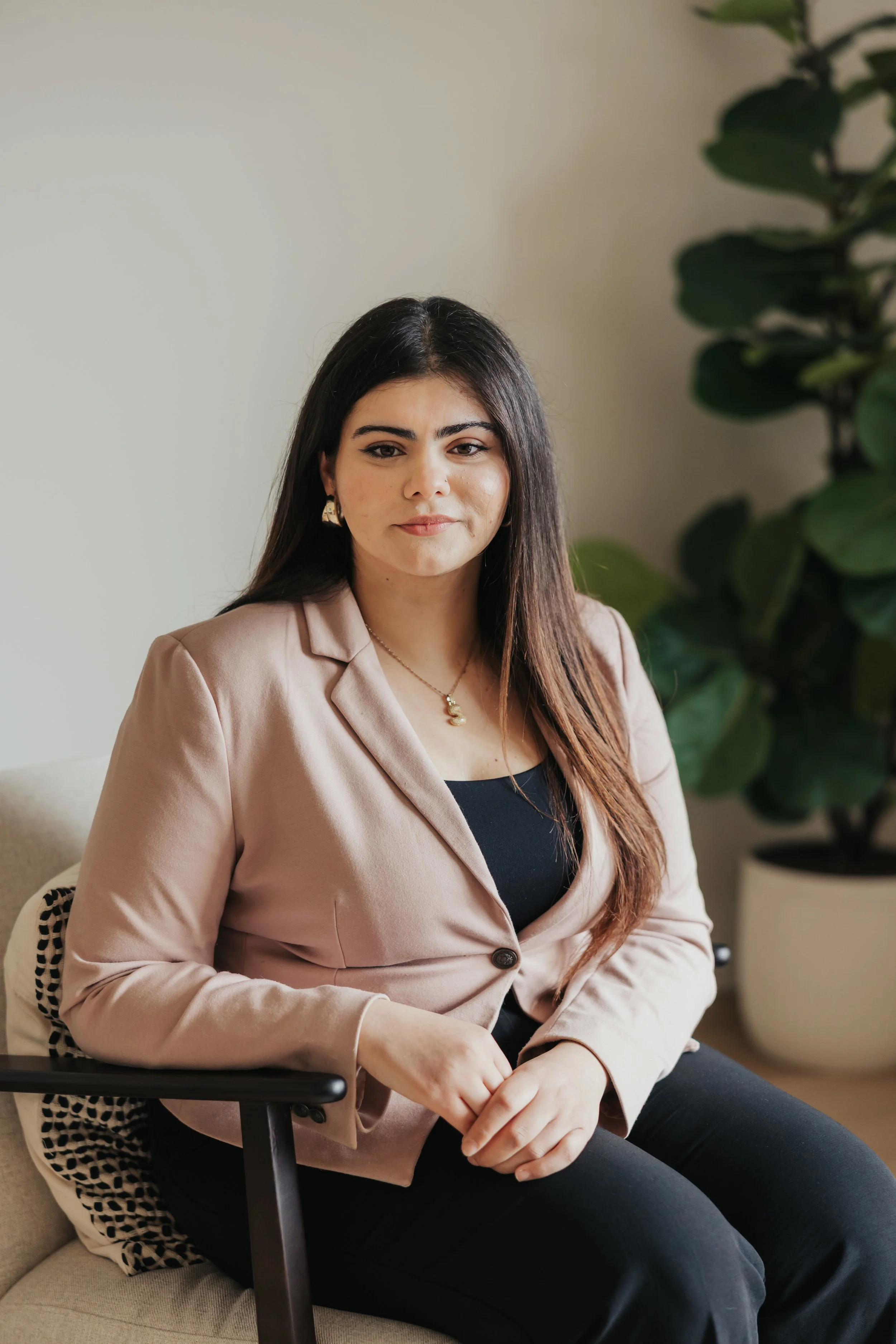 A headshot of Sara Koussan, office manager and administrator of Mint Legal in Calgary, Alberta.