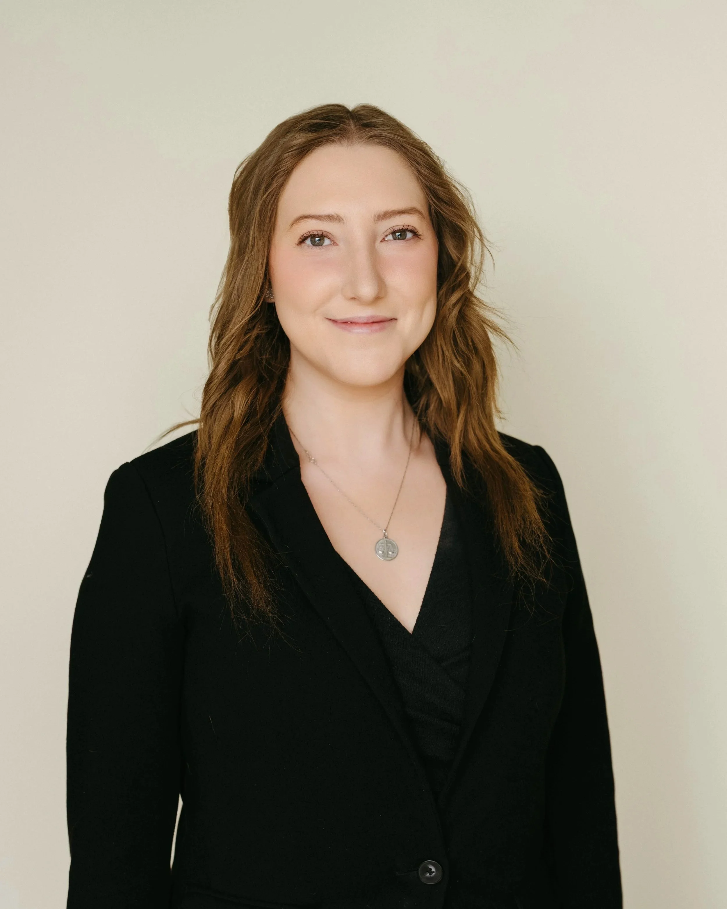 A headshot of Courtney Mann, legal assistant in Calgary, Alberta.