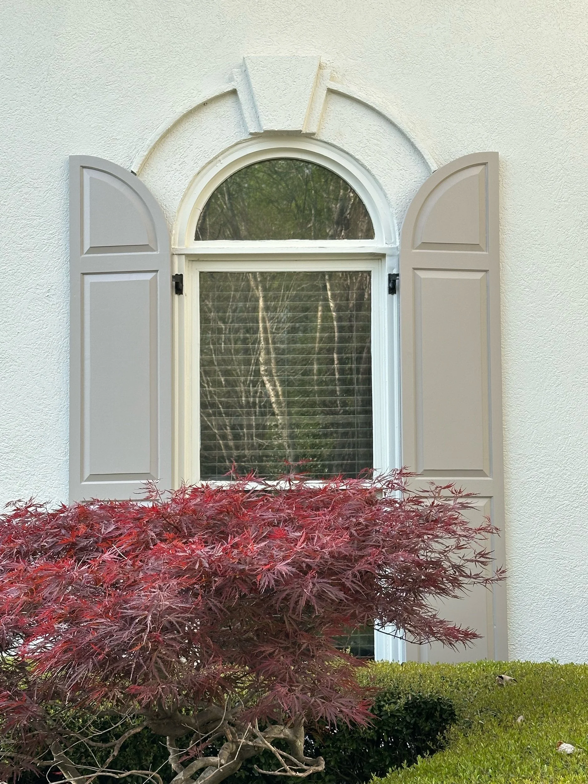 Curved top raised panel shutters 