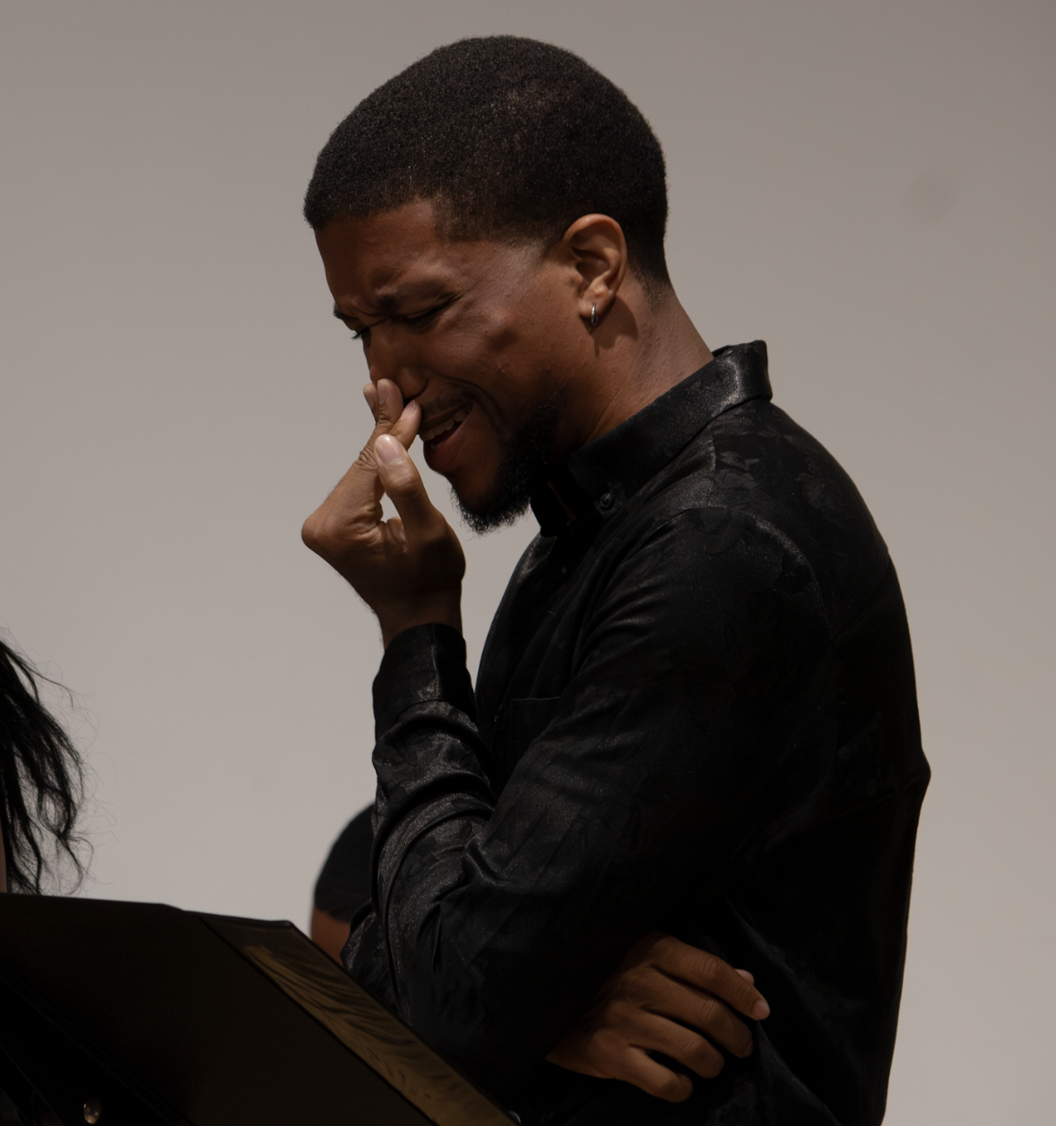 as Langston Hughes in a reading of "A Soviet Film on Negro Life in America" (2025) written by Alle Mims. 