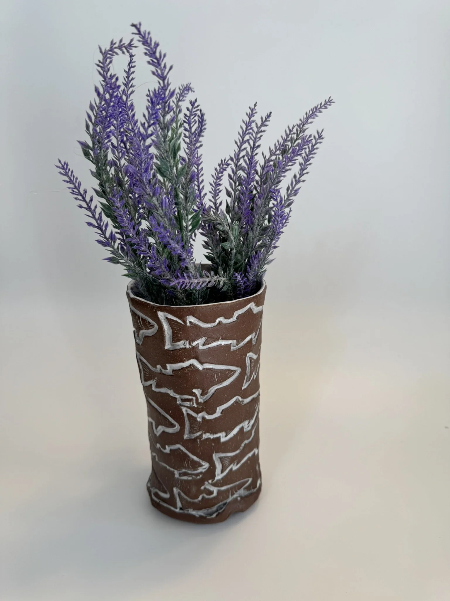 tall fish vase