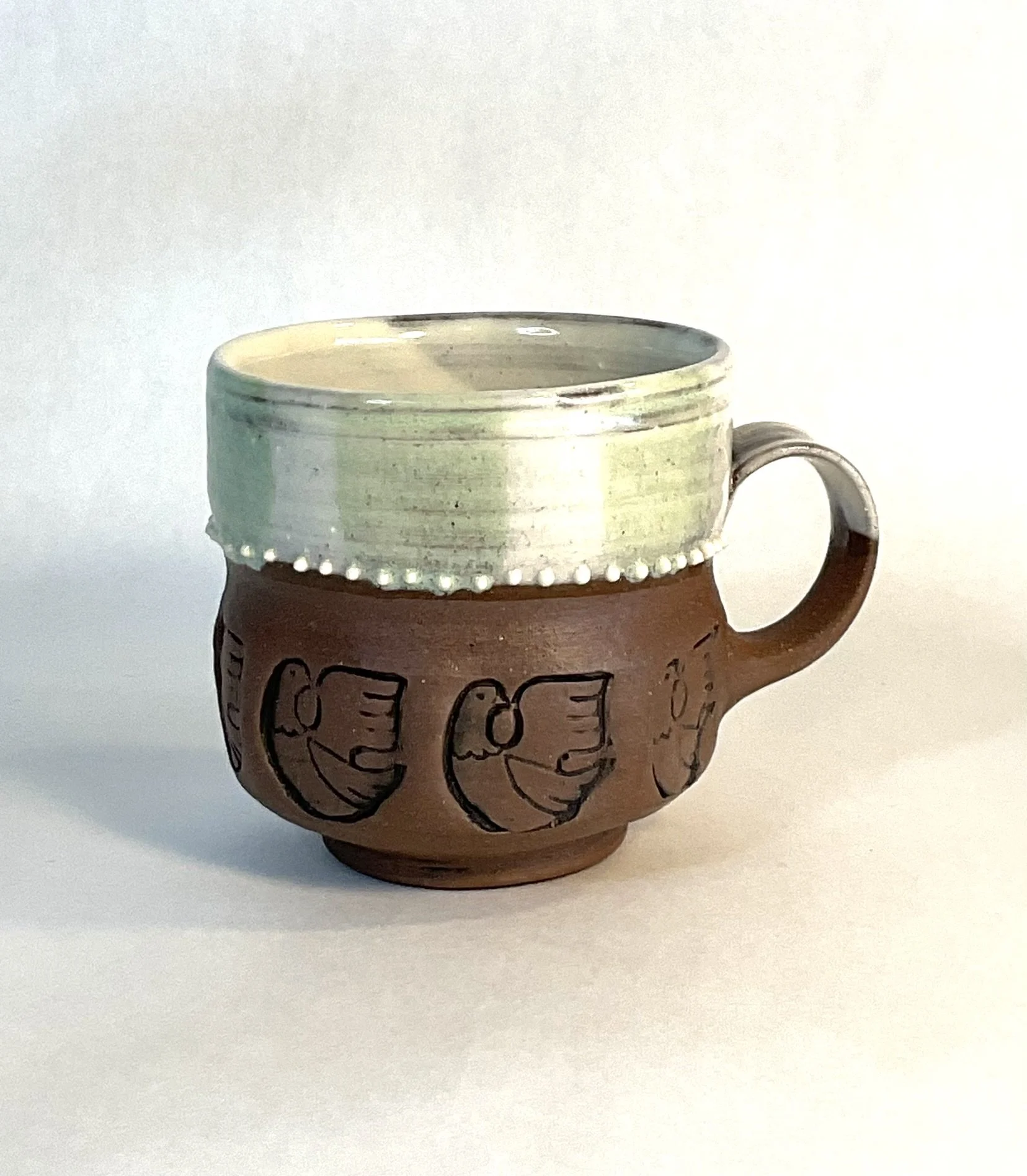 Sielulintu Bird Stamped mug
