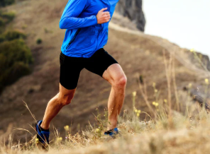 A gloved hand holding a transparent CaDI cartridge. 