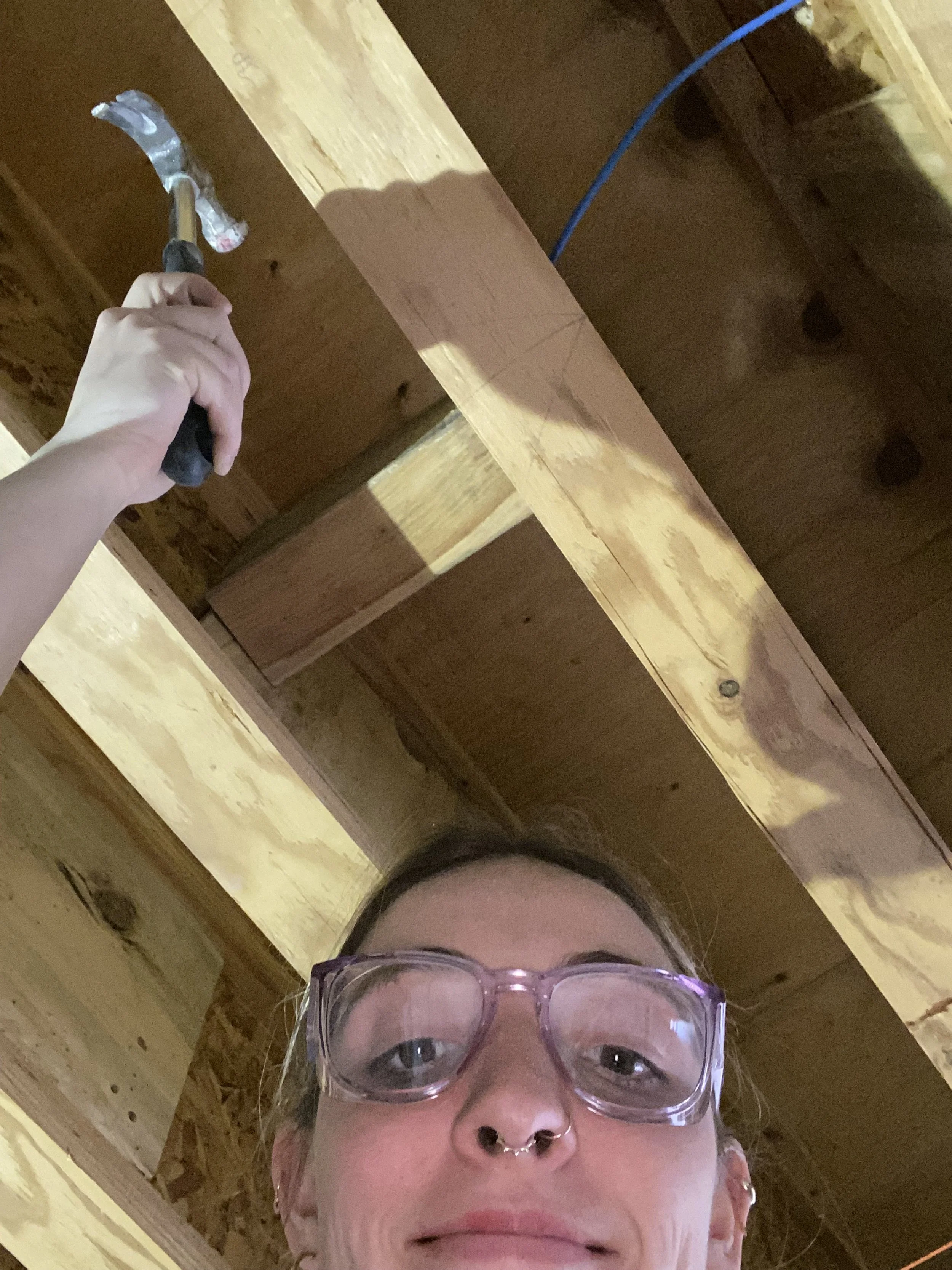 I insulated the mezzanine and did lots of hammering little wood inserts. 