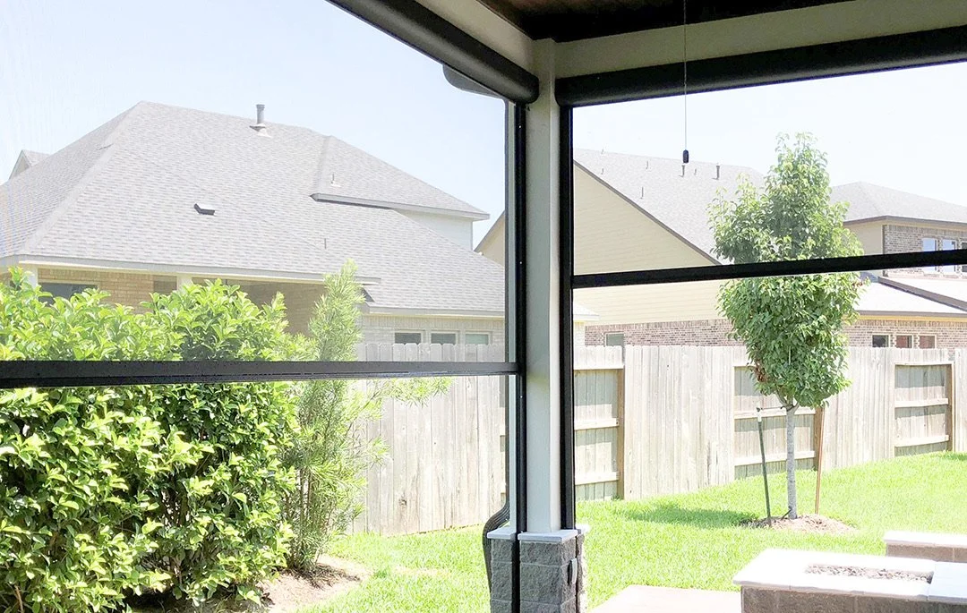 Motorized shades on covered patio.