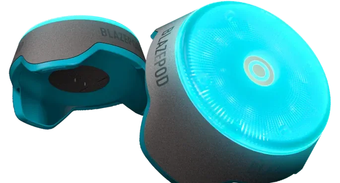 A pair blaze pods with one turned on and glowing blue, and the other with the interior visible.