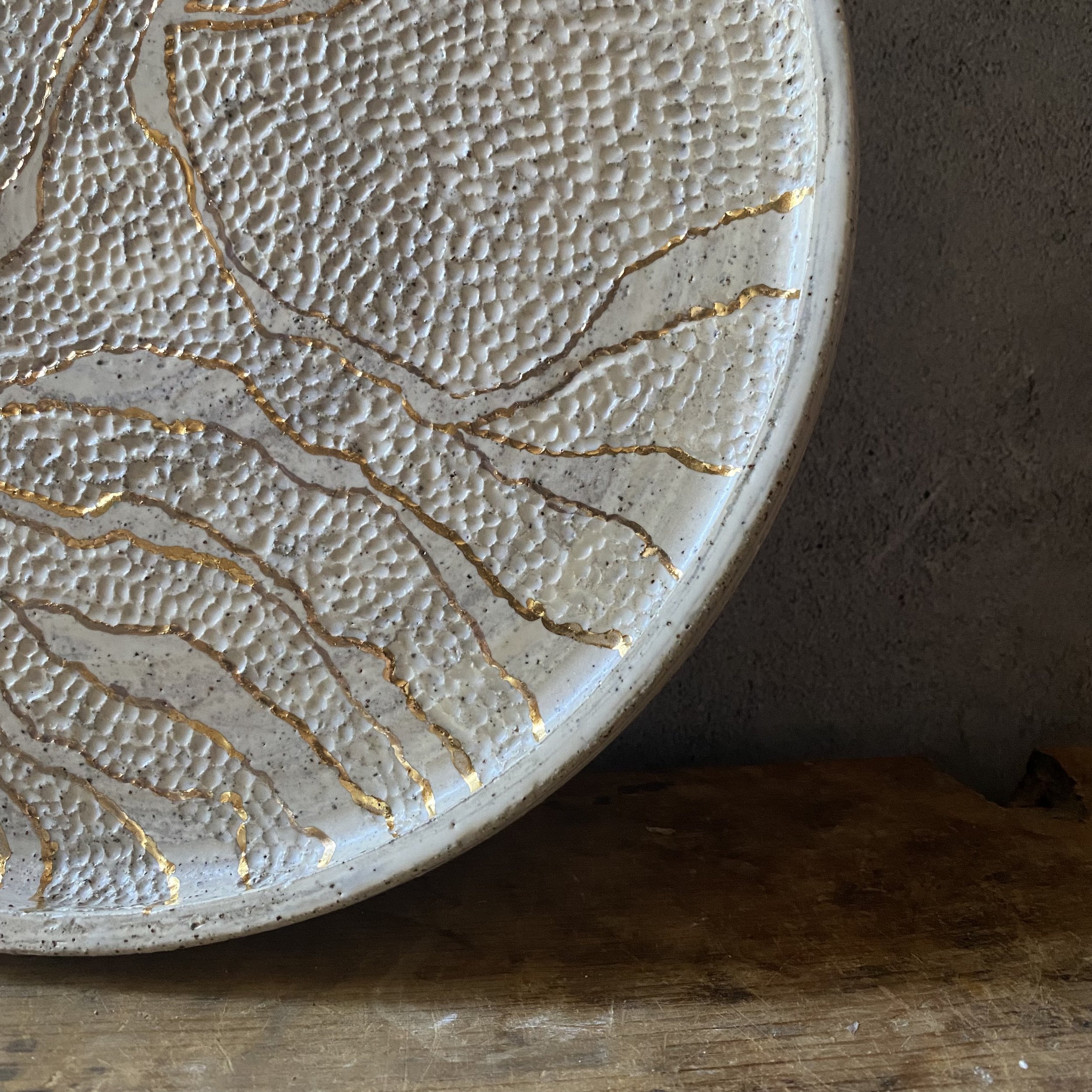 Unearthed handmade ceramic dish with gold lustre and handcarved