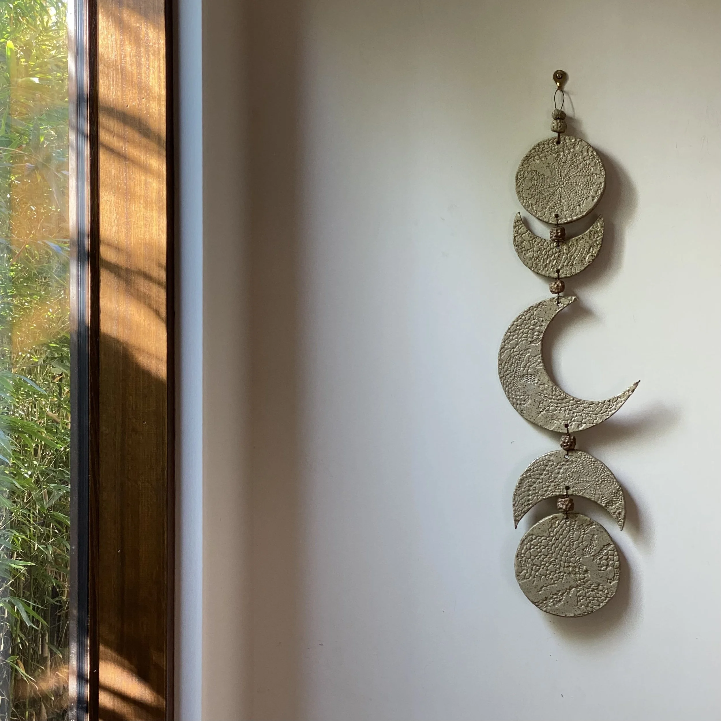 Handmade ceramic wall art Moon phase hanging