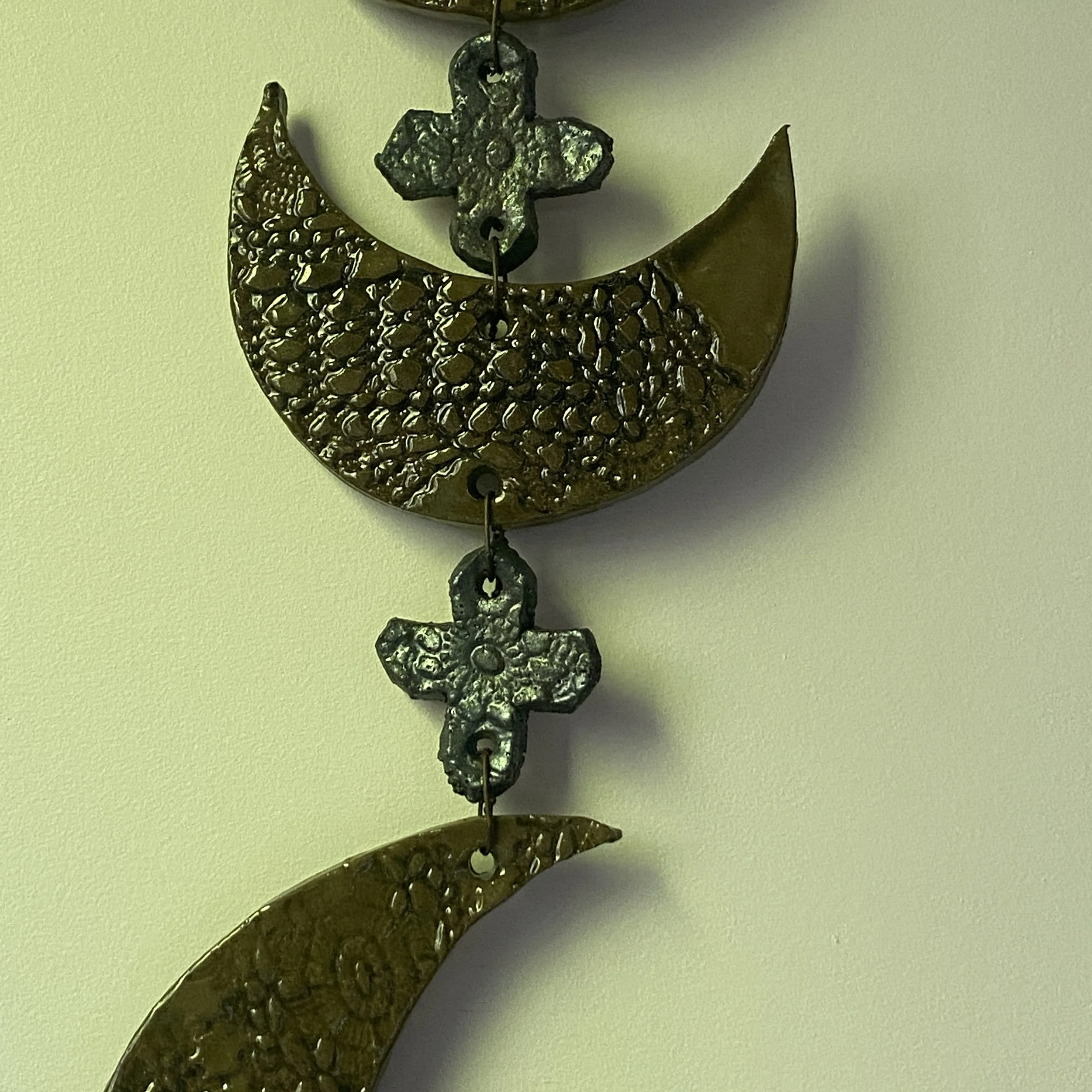 Handmade ceramic Moon phase wall hanging detail