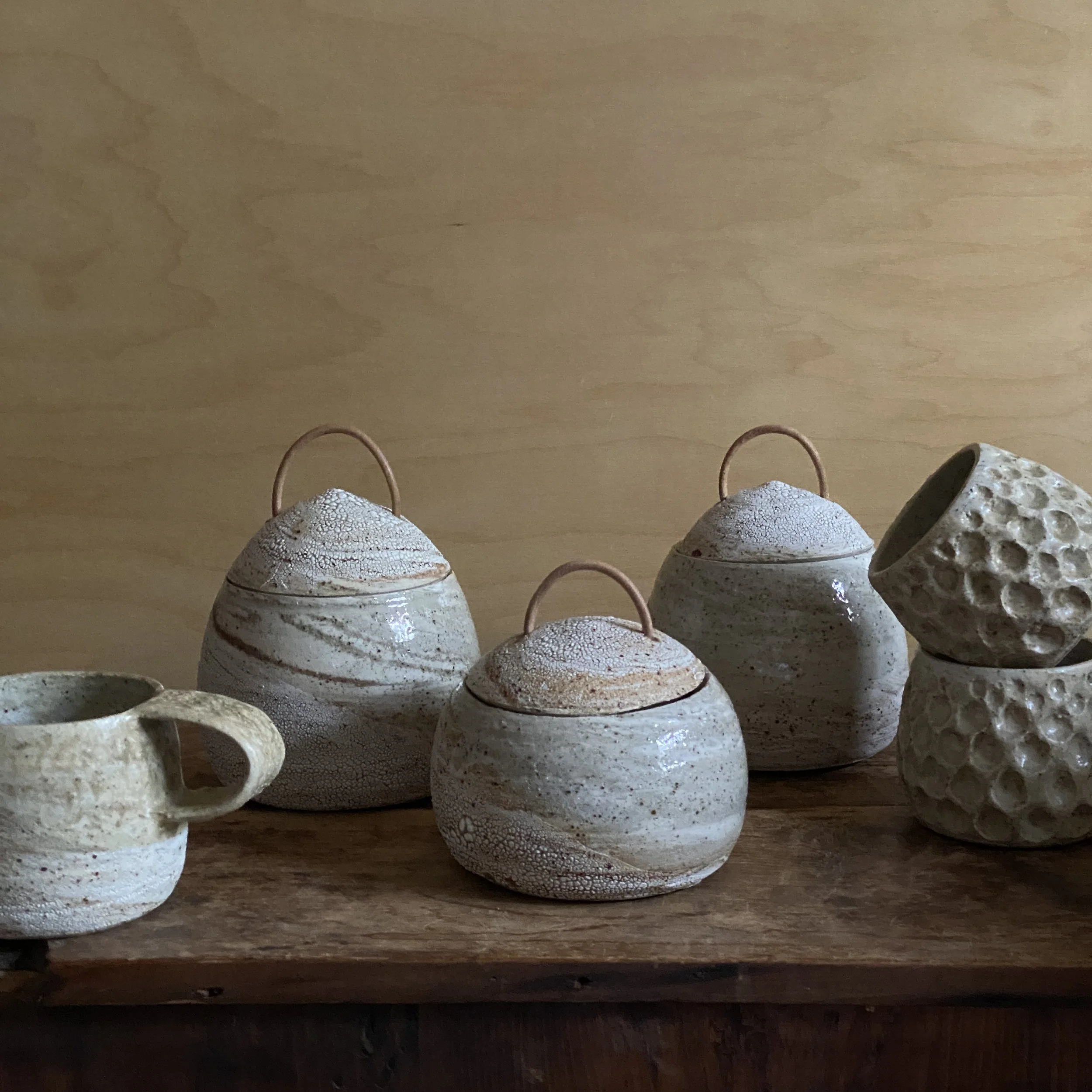 Unearthed Pebble Canister set  with a range of handmade crockey