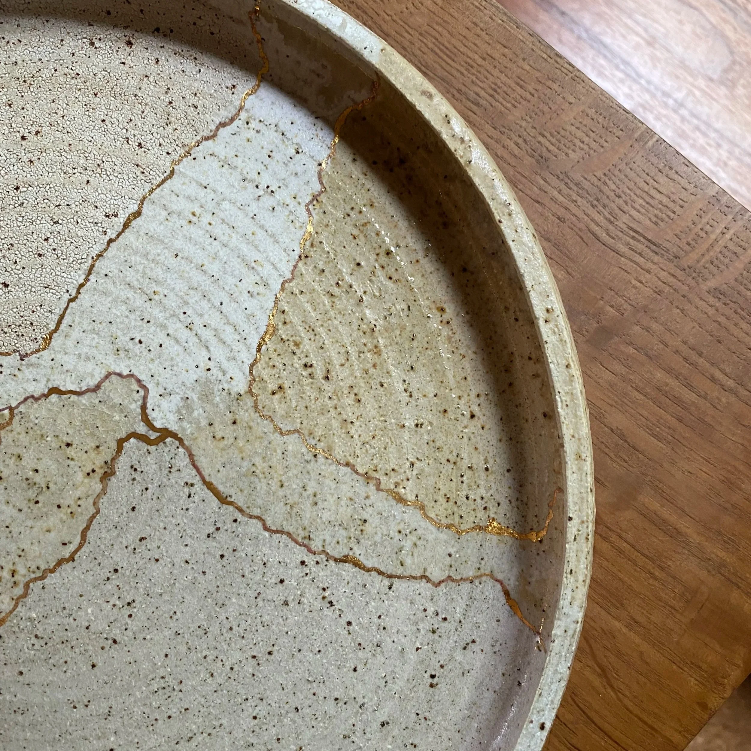 Handmade ceramic Unearthed Terra Firma Platter with Gold seam details
