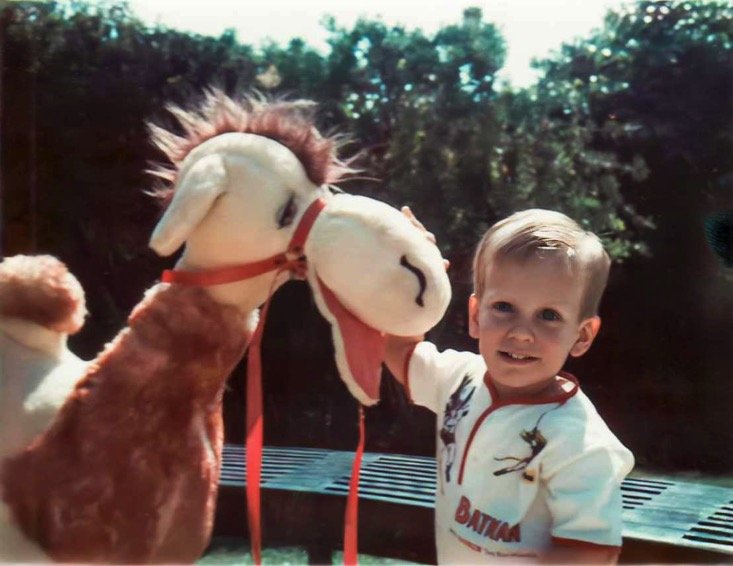Pretty happy with my big stuffed camel at the Huston Street house - 1967.