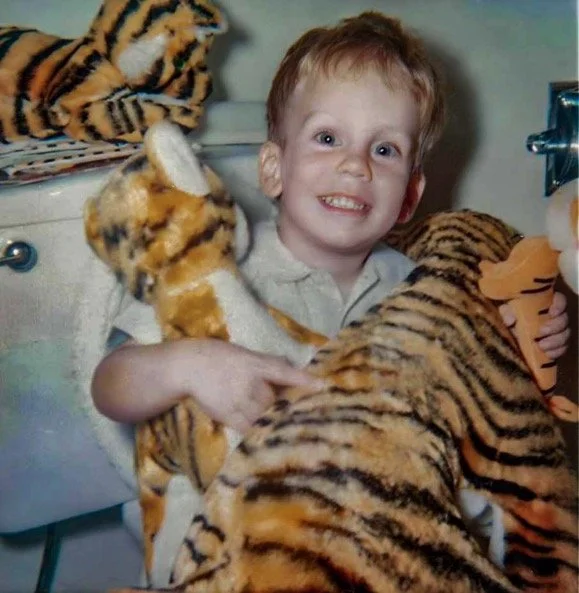 On the toilet with tigers in hand at Huston Street - 1967.