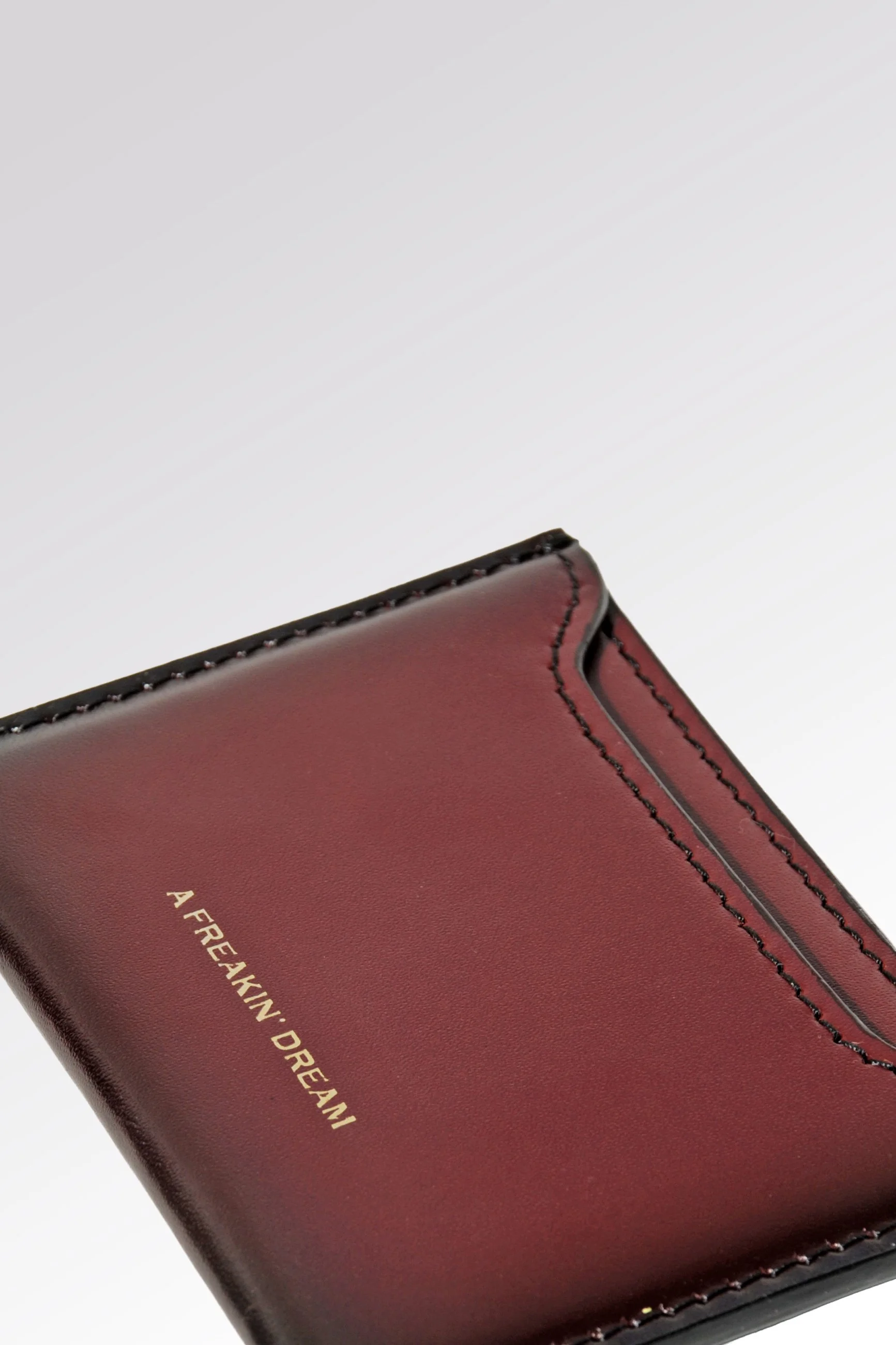 Handmade Italian leather card holder with Shiny Burgundy hand-airbrushed finish