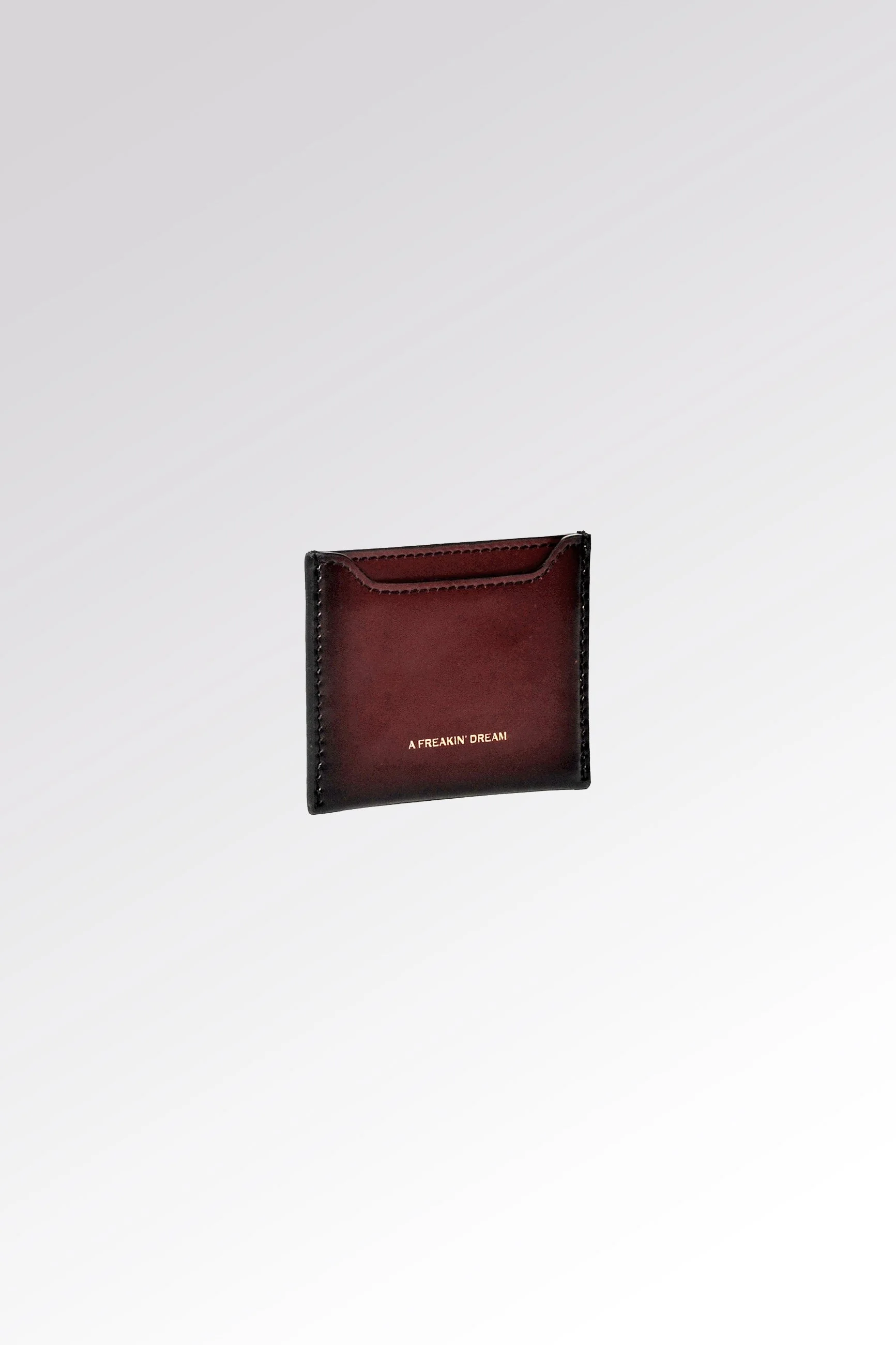 Slim burgundy leather card holder with two card slots