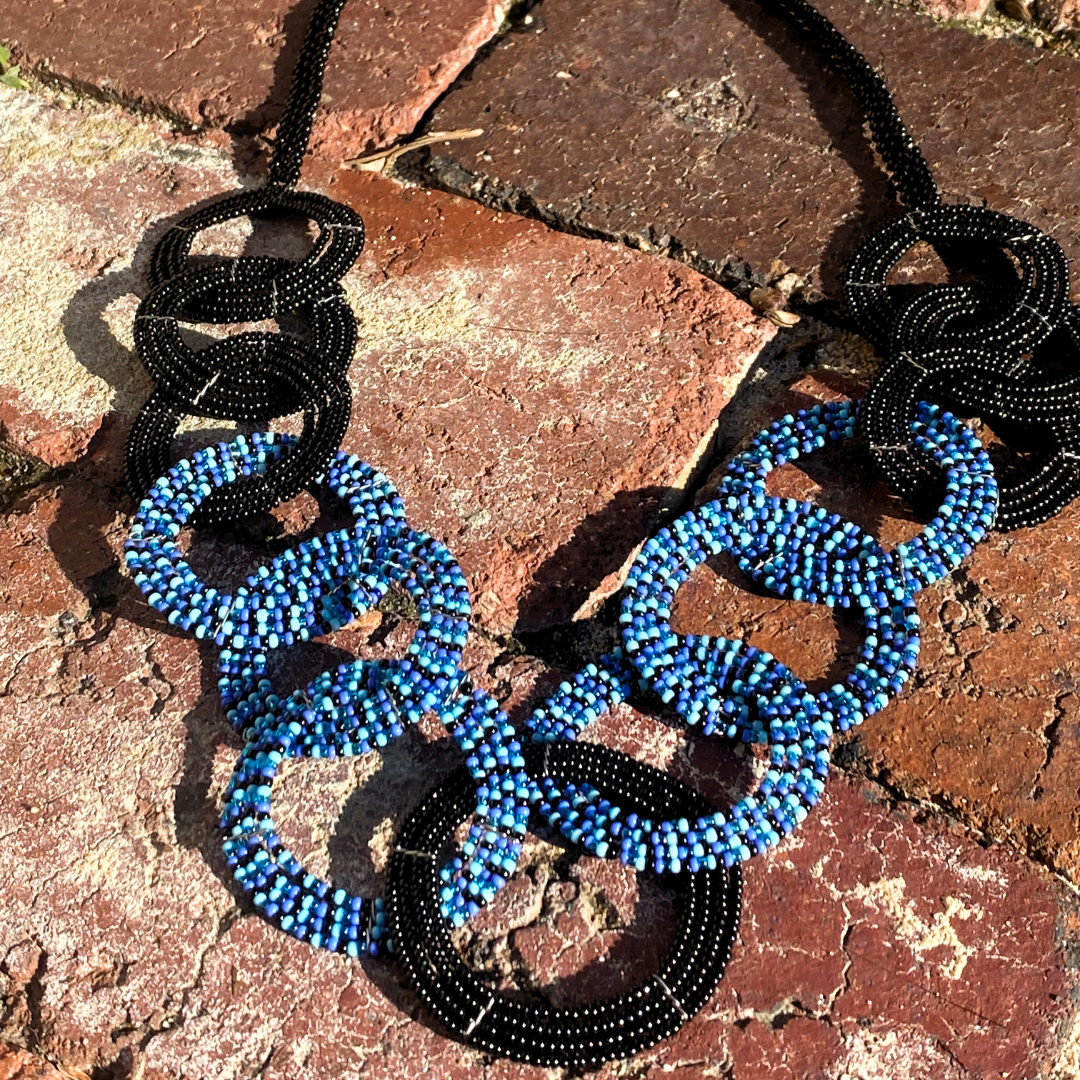 SS Beaded necklace blue and black circles.png