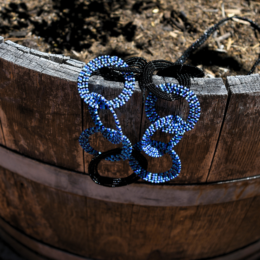 Necklace Circles on a string Blue Black.png