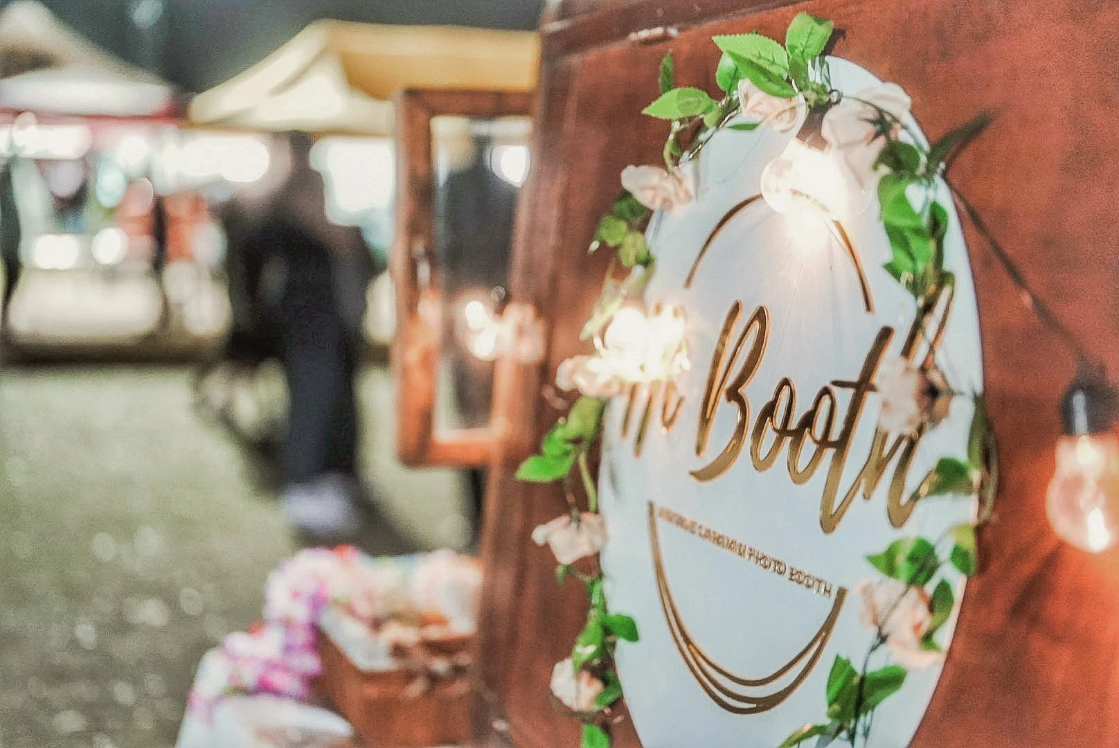 Logo w Flower String.JPG