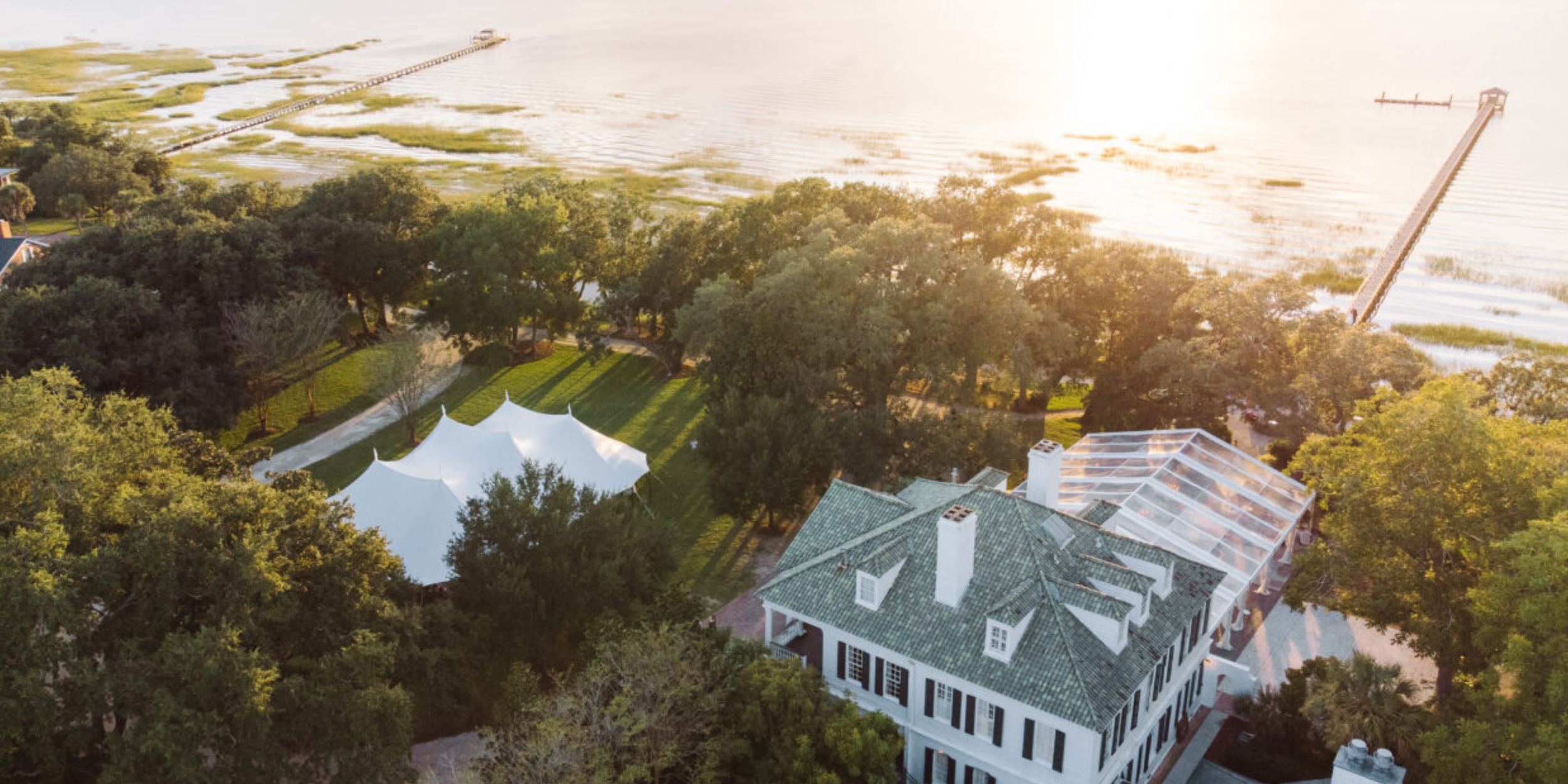 Overhead view of the Lowndes Grove Plantation wedding venue with a reception tent set up