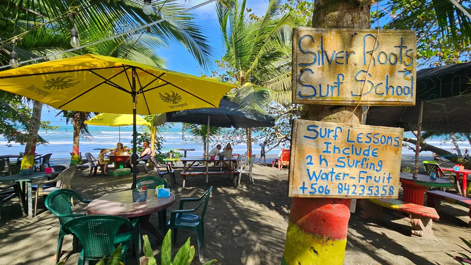 Tables on beach beside Caribbean Sea