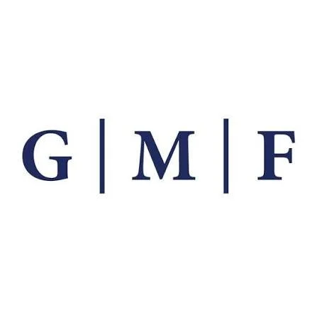 GMF logo with three vertical bars separating the letters G, M, and F