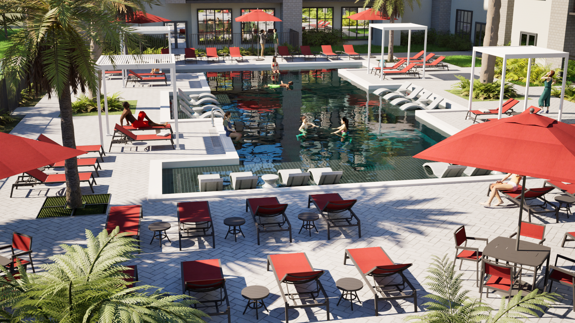 A swimming pool area at a modern residential complex with people relaxing on lounge chairs and swimming, surrounded by red umbrellas, trees, and landscaped greenery.