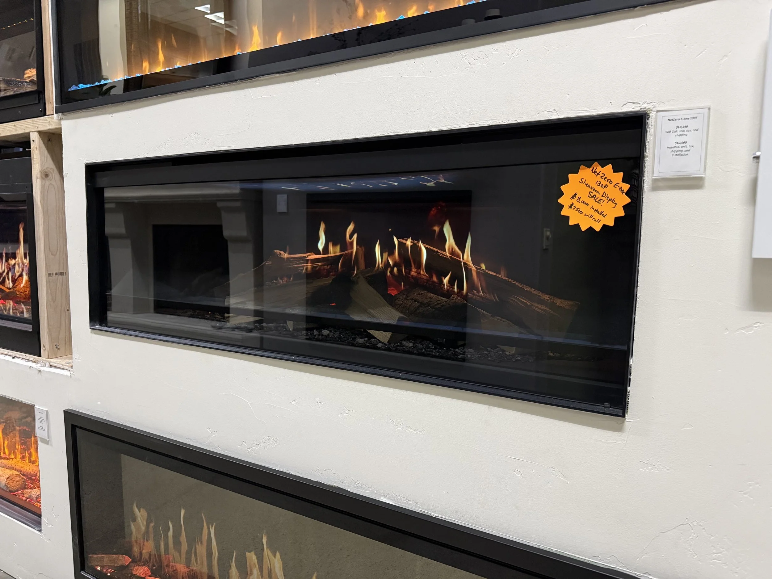 NetZero E-One 130F 51.5" Holographic Electric Showroom Display Fireplace $8000 installed or $7500 will call. Retail $9585 +tax, shipping, and installation