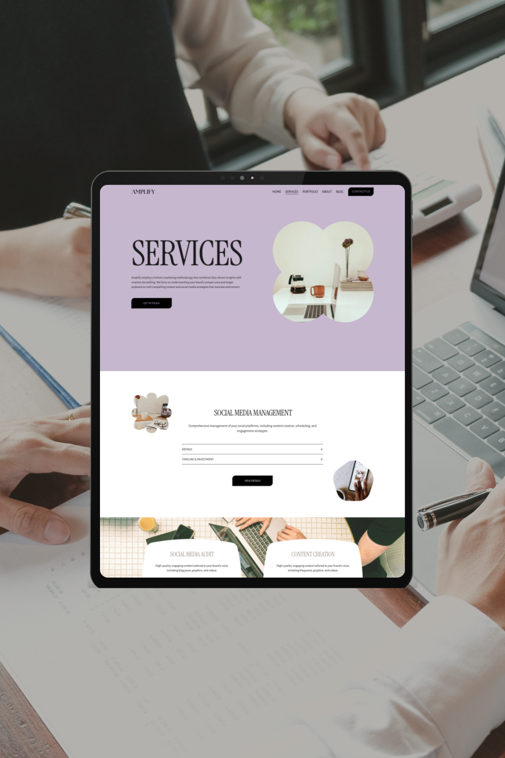 Laptop screen displaying a marketing website with a purple background, black text, and images of office supplies and social media management services.