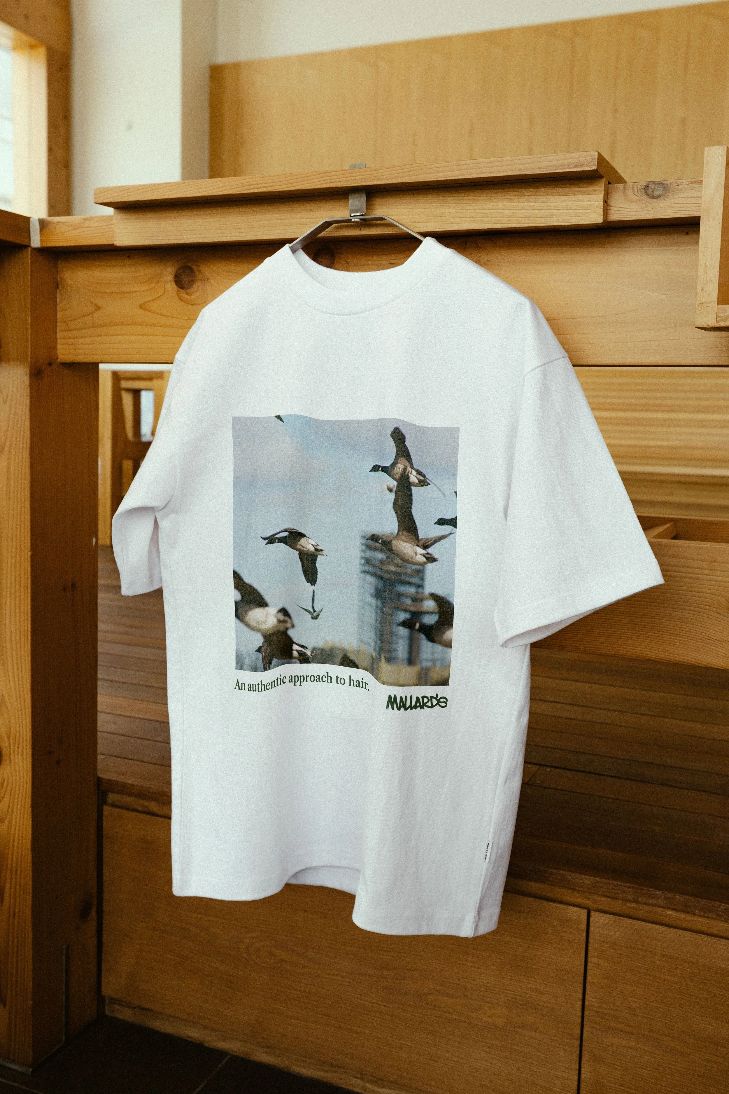 SN_Mockup-EoM-T_Shirt-01.jpg