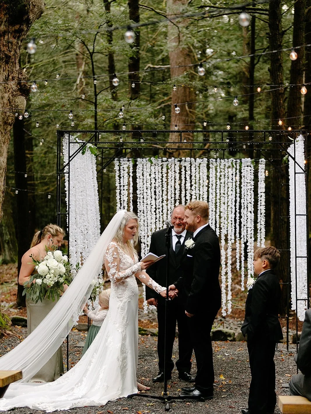 Step into the woods where the mist meets the moonlight and vows feel eternal. Imagine saying &ldquo;I do&rdquo; under towering pines, surrounded by candlelight, soft music, and the magic of forever.

Perfect for couples who crave romance, mystery, an