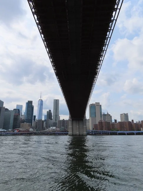 Passing under one of several. bridges