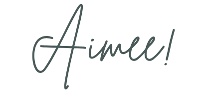 The word 'Aimee!' written in cursive script on a black background.