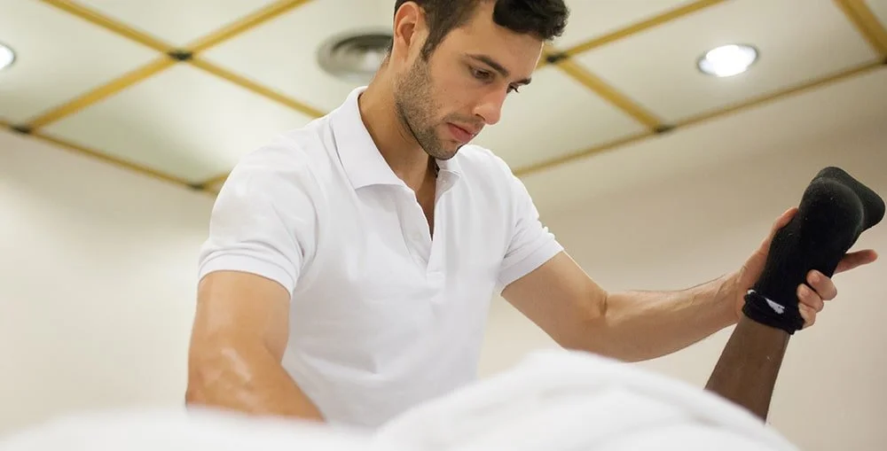 Registered massage therapist providing relaxation massage, representing RMT career training and practice in British Columbia.