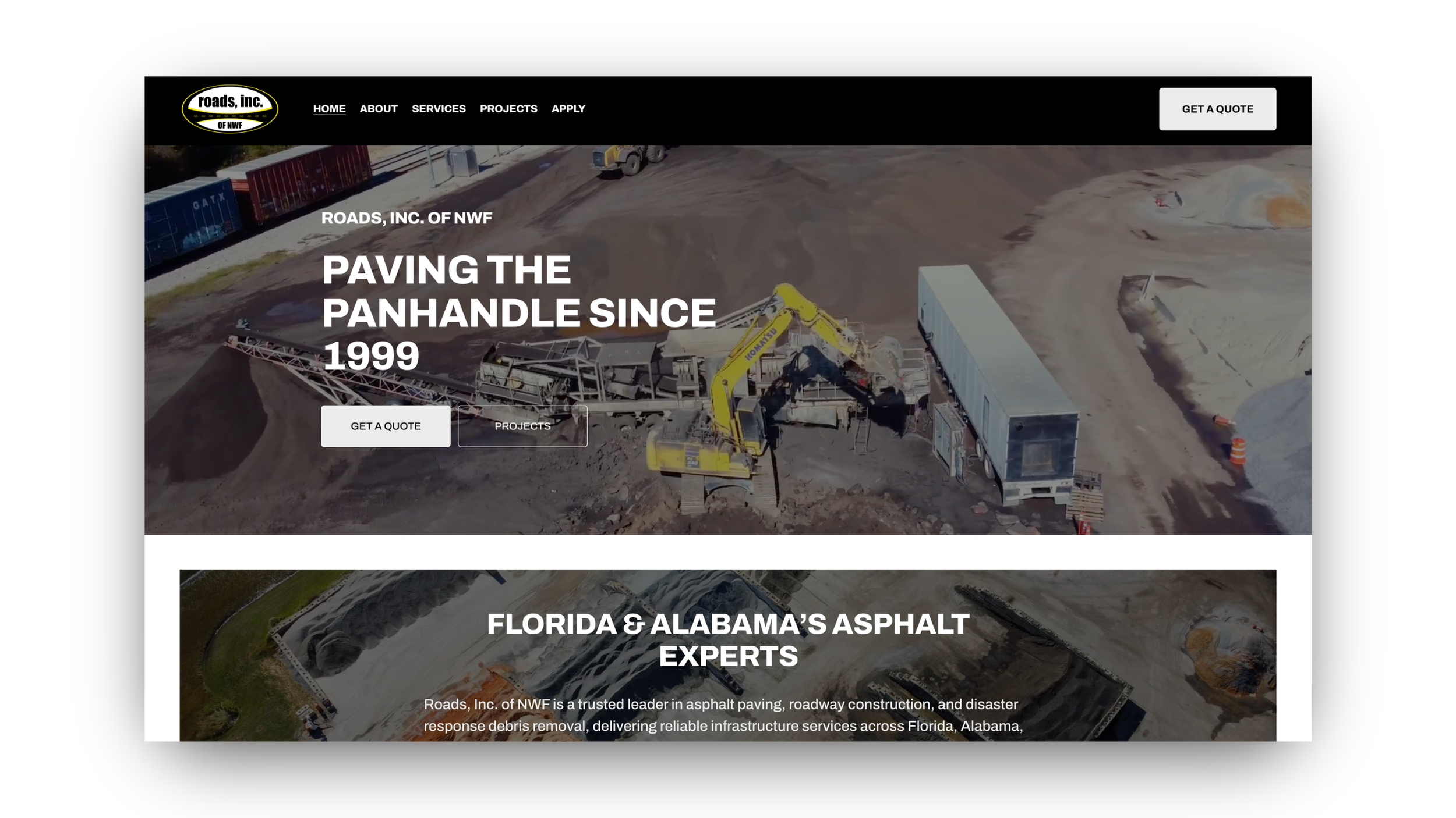 Aerial view of a construction site with heavy machinery, dirt mounds, and train cars in the background, promoting asphalt paving services.